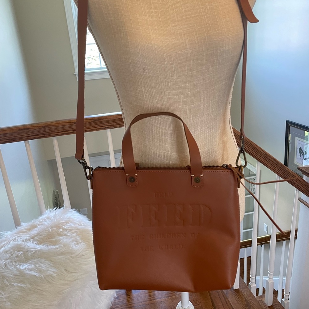 FEED crossbody tote.
